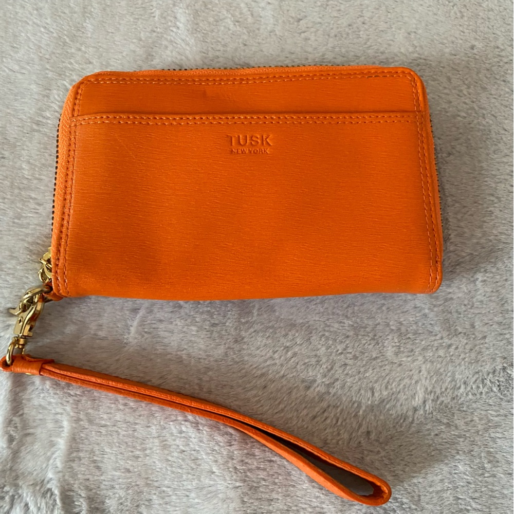 Tusk orange zip around wallet/wristlet